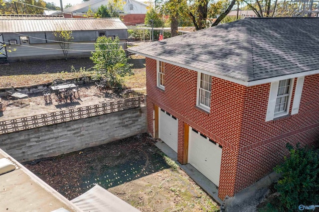 exterior space featuring a garage