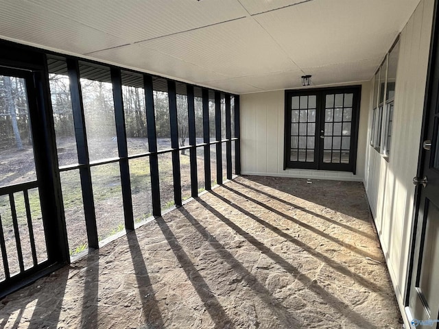 unfurnished sunroom with plenty of natural light