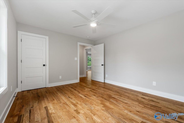 interior space featuring wood-type flooring and ceiling fan