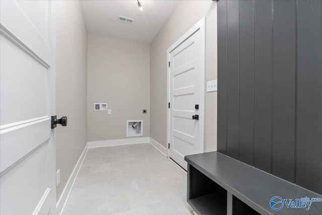 laundry area featuring hookup for a washing machine and hookup for an electric dryer