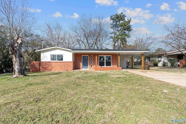 ranch-style house featuring a front yard, an attached carport, concrete driveway, and brick siding