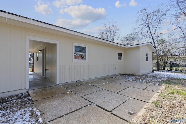 rear view of house featuring a patio