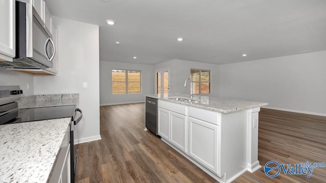 111 Wellspring Rd, Huntsville, AL 35810 - kitchen with appliances with stainless steel finishes, a sink, open floor plan, dark wood finished floors, and white cabinets