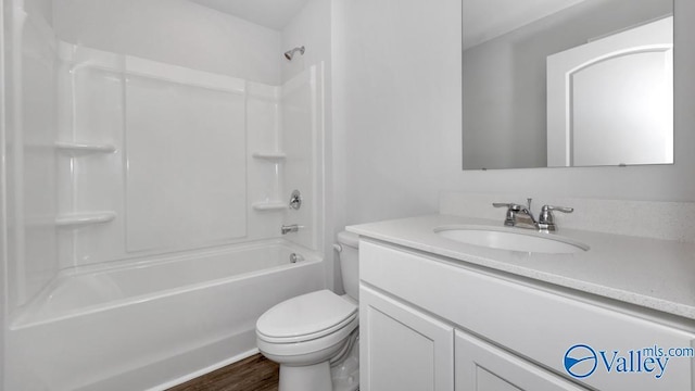 111 Wellspring Rd, Huntsville, AL 35810 - bathroom with vanity, toilet, bathing tub / shower combination, and wood finished floors