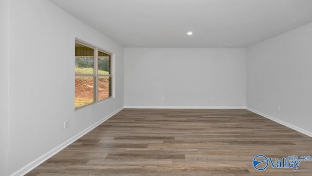 111 Wellspring Rd, Huntsville, AL 35810 - spare room with baseboards, wood finished floors, and recessed lighting
