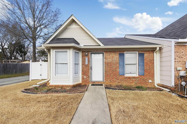 view of front of property with a front lawn