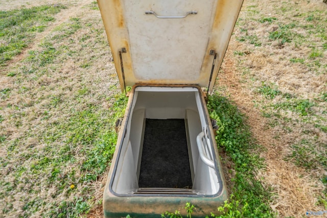 view of entry to storm shelter