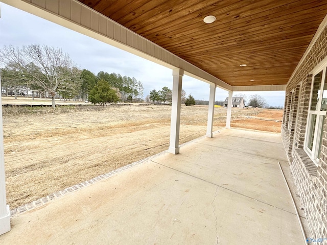 view of patio / terrace with a rural view