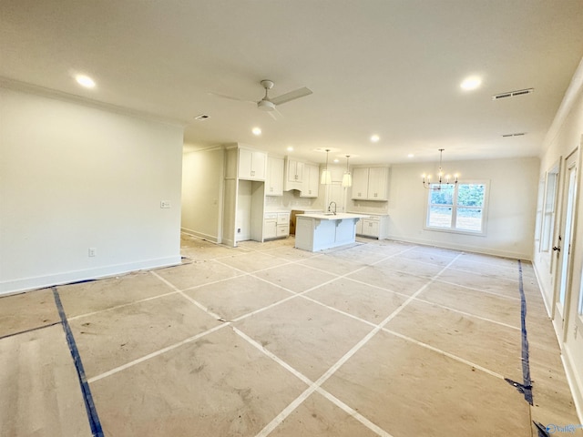 unfurnished living room with recessed lighting, visible vents, baseboards, and ceiling fan with notable chandelier