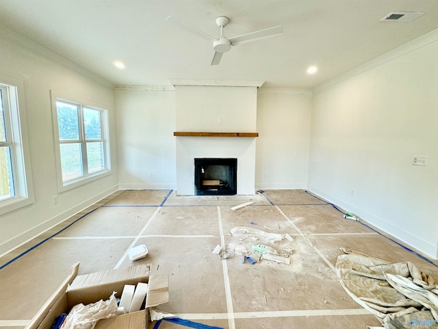 unfurnished living room with recessed lighting, visible vents, ornamental molding, a fireplace with flush hearth, and baseboards