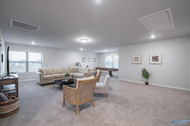 carpeted living room featuring a wealth of natural light and billiards