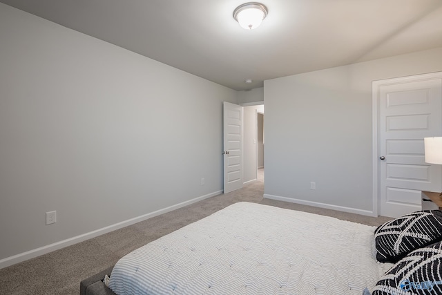 bedroom with light colored carpet