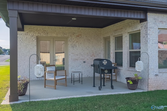 view of patio / terrace featuring area for grilling and french doors