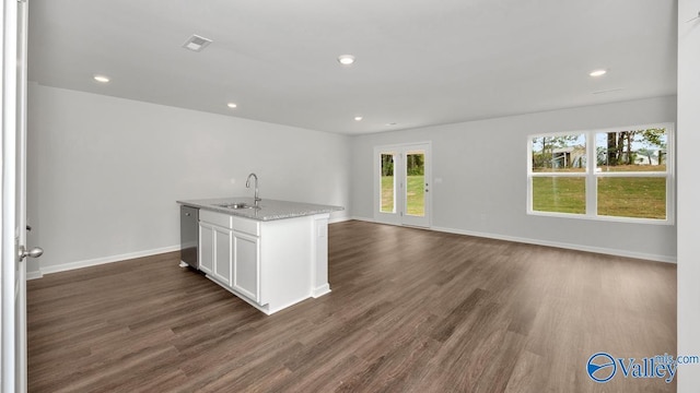 123 Trestle Point Dr, Harvest, AL 35749 - kitchen with a sink, dark wood-type flooring, white cabinetry, open floor plan, and recessed lighting