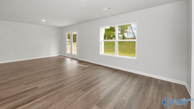 123 Trestle Point Dr, Harvest, AL 35749 - unfurnished room featuring dark wood-style flooring, baseboards, and recessed lighting