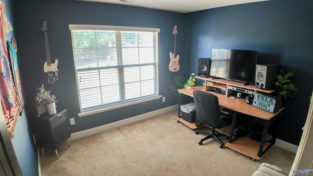 carpeted office space with plenty of natural light