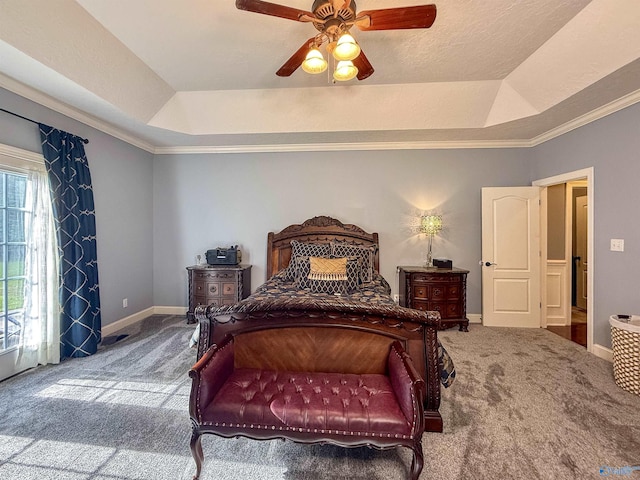 166 Hickory Rdg, Glencoe, AL 35905 - carpeted bedroom featuring a tray ceiling, baseboards, crown molding, and a ceiling fan