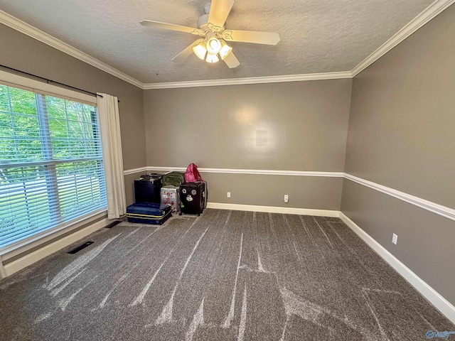 166 Hickory Rdg, Glencoe, AL 35905 - carpeted empty room featuring a textured ceiling, a ceiling fan, baseboards, and crown molding
