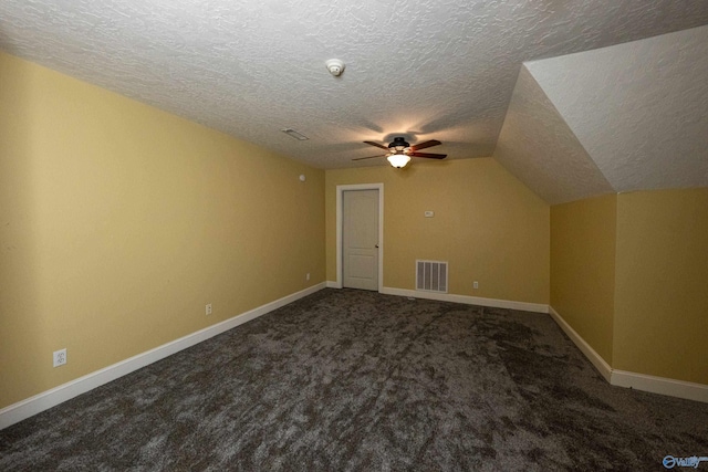 166 Hickory Rdg, Glencoe, AL 35905 - bonus room with a ceiling fan, a textured ceiling, carpet floors, lofted ceiling, and baseboards