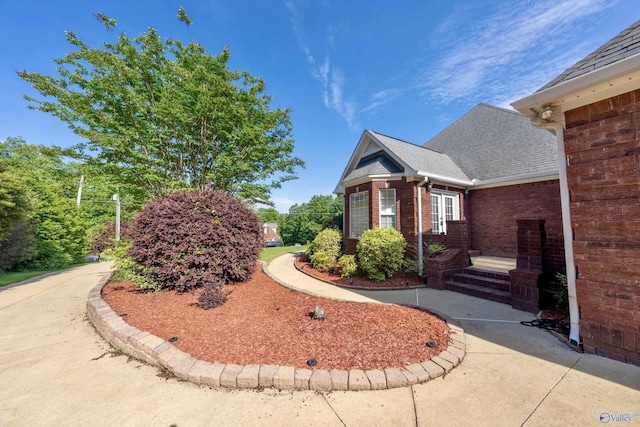 166 Hickory Rdg, Glencoe, AL 35905 - view of home's exterior with brick siding and a shingled roof
