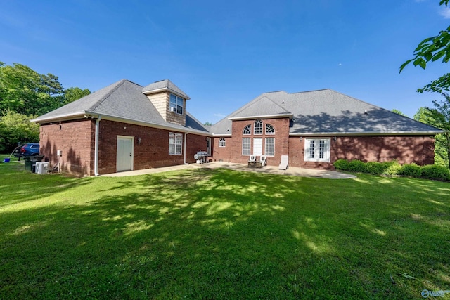 166 Hickory Rdg, Glencoe, AL 35905 - back of house featuring french doors, a patio, brick siding, and a lawn