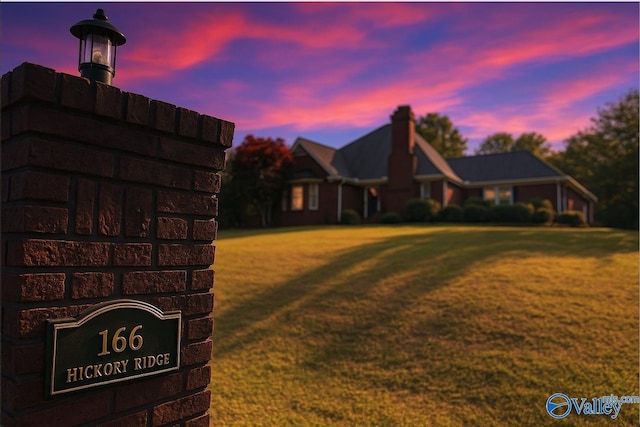 166 Hickory Rdg, Glencoe, AL 35905 - view of front facade featuring a lawn and a chimney