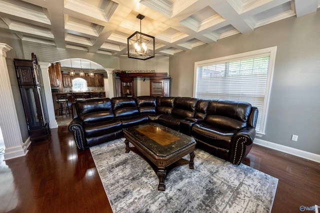 166 Hickory Rdg, Glencoe, AL 35905 - living room featuring ornate columns, arched walkways, baseboards, coffered ceiling, and dark wood-style floors