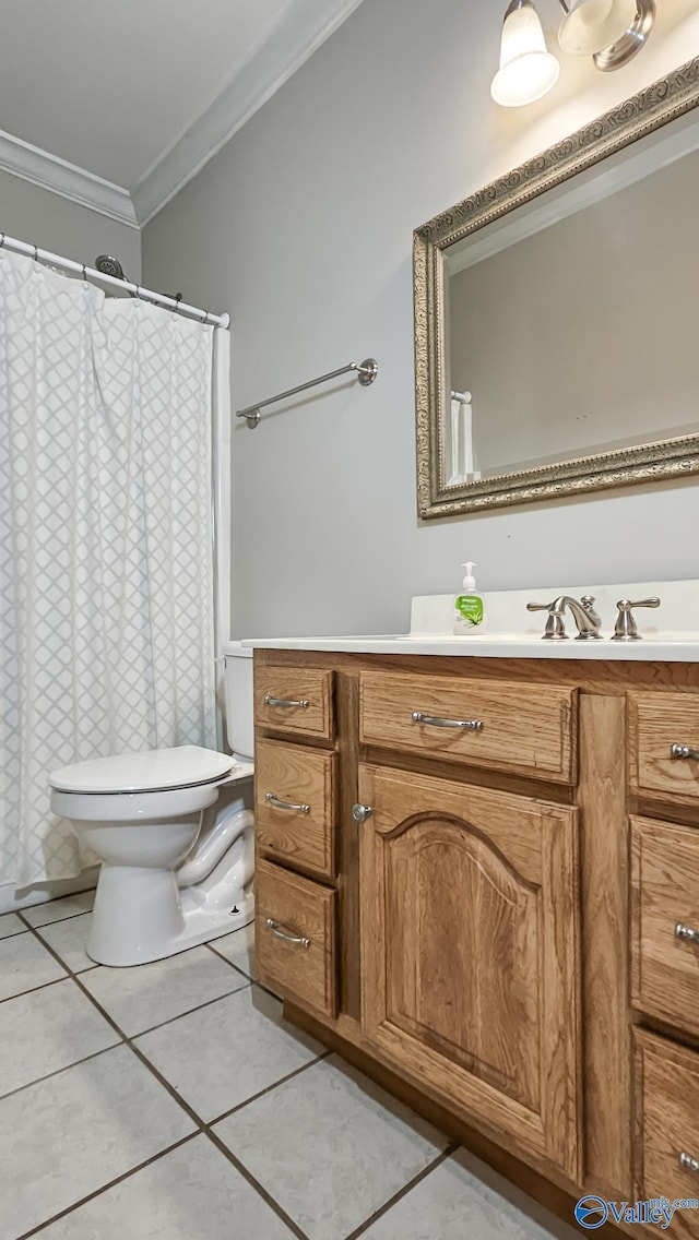 full bathroom with tile patterned flooring, vanity, toilet, ornamental molding, and curtained shower