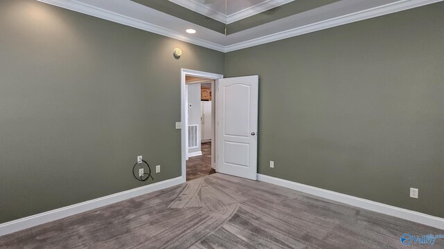 carpeted empty room with baseboards, ornamental molding, visible vents, and recessed lighting