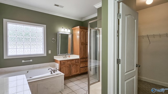 bathroom featuring visible vents, crown molding, vanity, a stall shower, and a garden tub