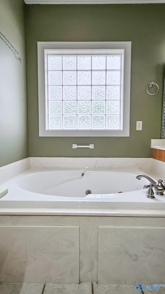 bathroom featuring a bath