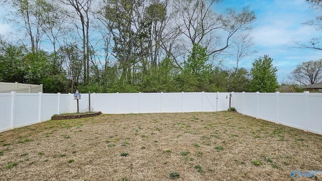 view of yard featuring a fenced backyard