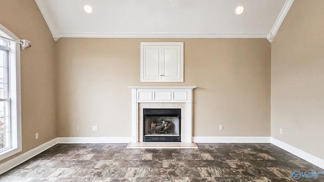 unfurnished living room featuring baseboards, ornamental molding, a fireplace, and plenty of natural light