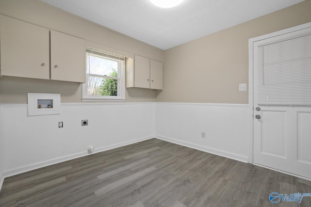 1816 Devonshire Dr SE, Decatur, AL 35601 - laundry room with cabinet space, hookup for an electric dryer, washer hookup, and wood finished floors