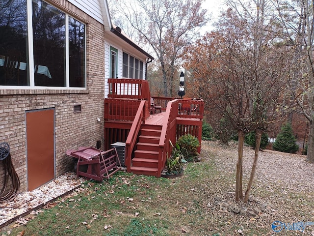 exterior space featuring a wooden deck