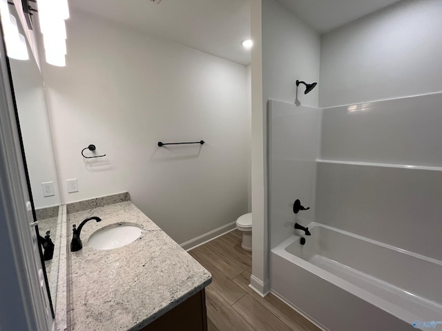 full bathroom with vanity, toilet, and tub / shower combination