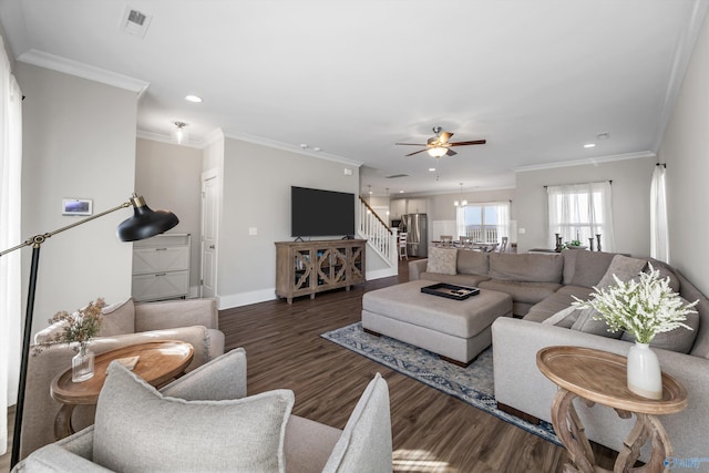 living area with dark wood-style floors, recessed lighting, ornamental molding, baseboards, and stairs