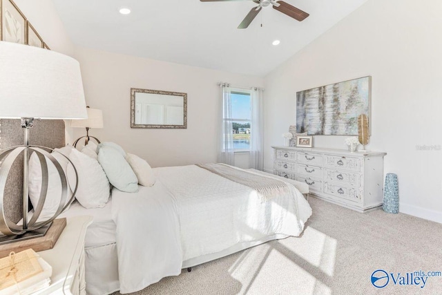 carpeted bedroom with a ceiling fan, recessed lighting, vaulted ceiling, and baseboards