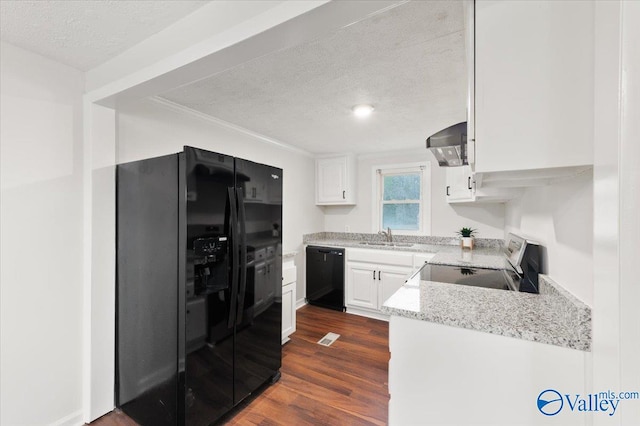 kitchen with white cabinetry, black appliances, dark hardwood / wood-style floors, and exhaust hood