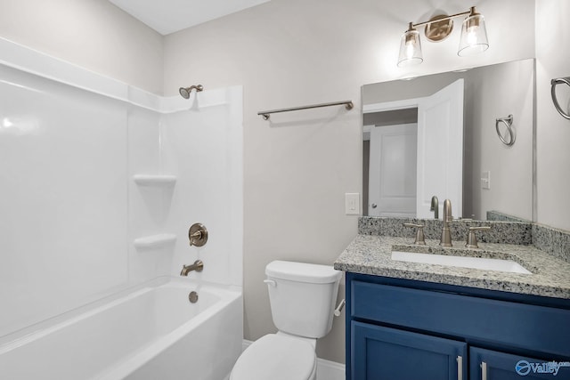 full bath featuring toilet, vanity, and bathtub / shower combination