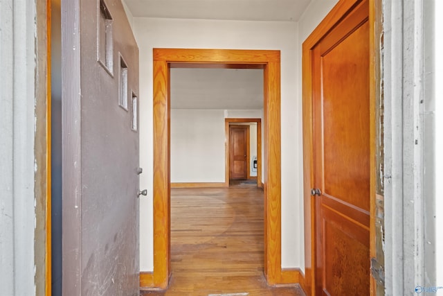 hallway featuring light wood-type flooring