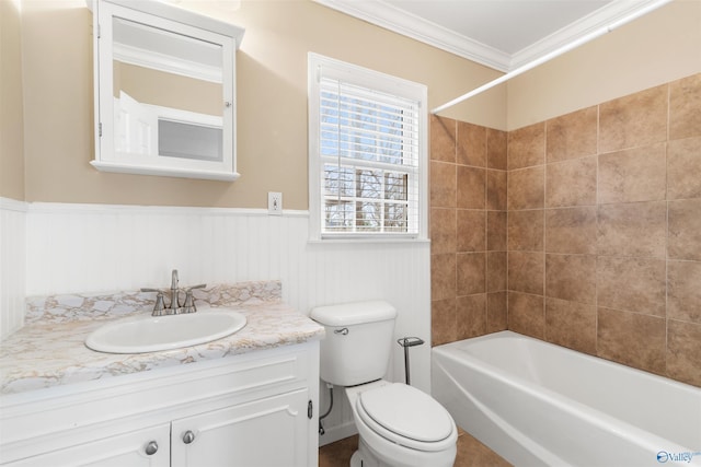 full bath featuring a wainscoted wall, toilet, ornamental molding, and vanity