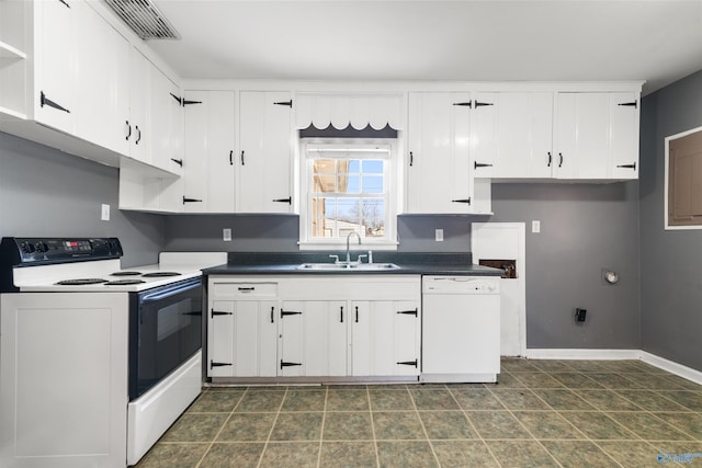 kitchen featuring dishwasher, white cabinetry, electric range oven, and a sink