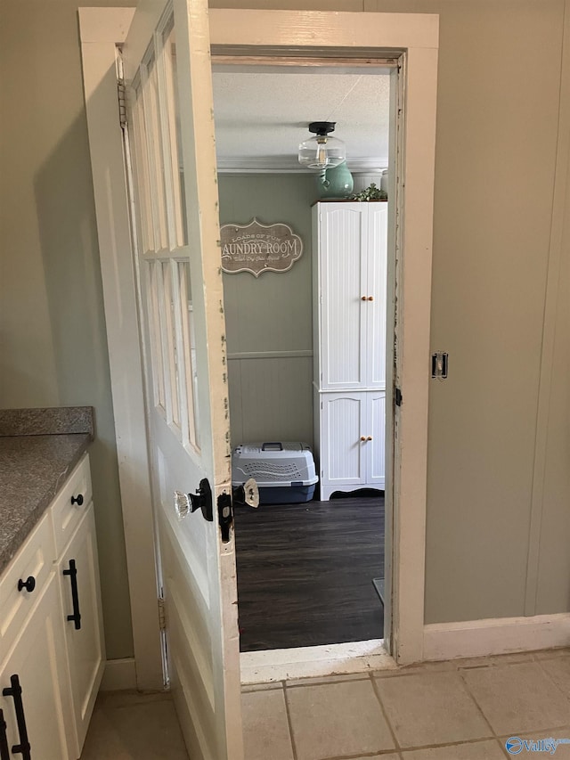 bathroom with tile patterned floors and vanity