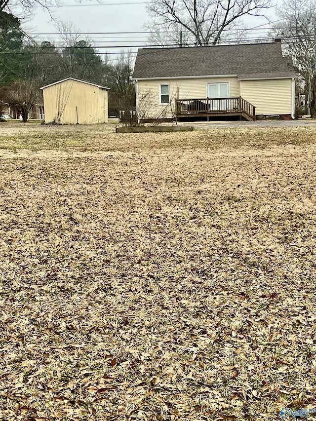 view of yard with a deck