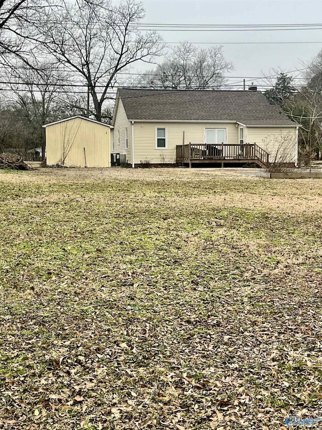 view of yard with a wooden deck