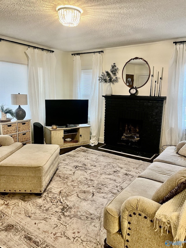 living room featuring a textured ceiling