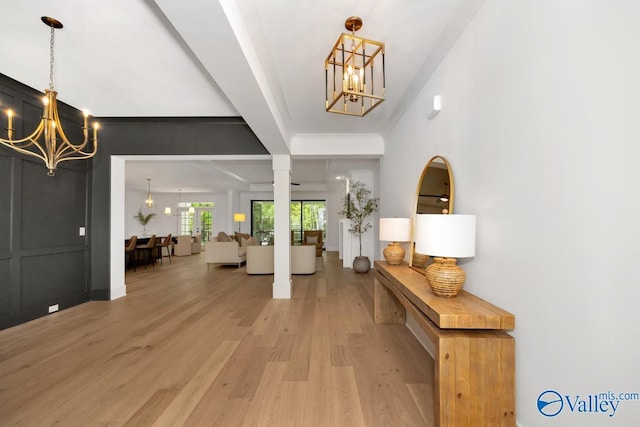 60 Trail Loop Rd, Huntsville, AL 35803 - foyer entrance with a chandelier and light wood finished floors