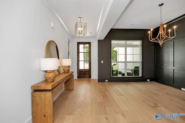 60 Trail Loop Rd, Huntsville, AL 35803 - foyer entrance with a chandelier and light wood finished floors