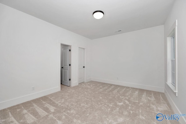 60 Trail Loop Rd, Huntsville, AL 35803 - carpeted spare room with baseboards